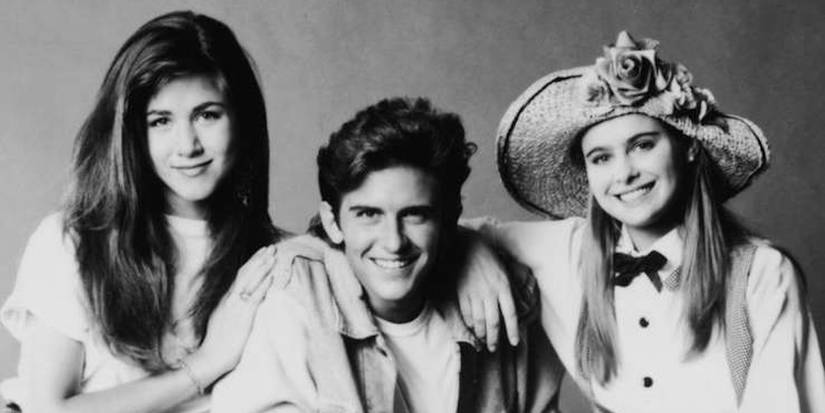 Jeannie (Jennifer Aniston), Ferris (Charlie Schlatter) and Sloan (Ami Dolenz) in a black and white promotional photo by Ferris Bueller.