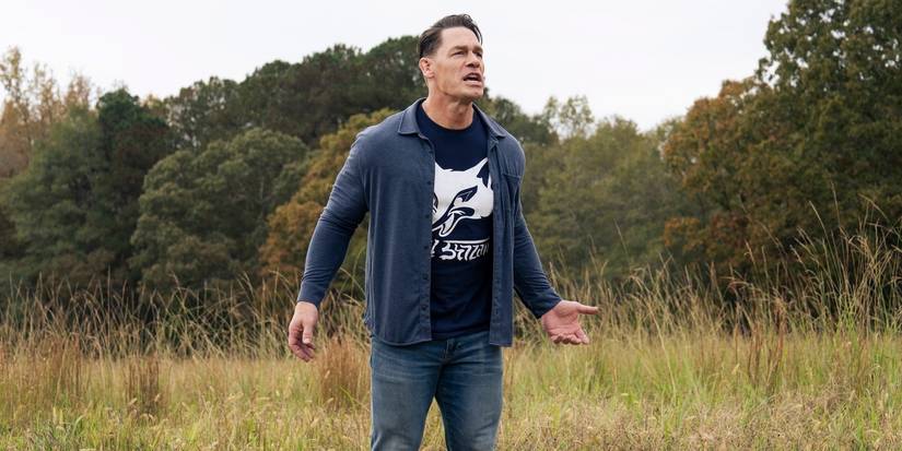 Chris (John Cena) alone in a field in the Peacemaker Season 2 finale