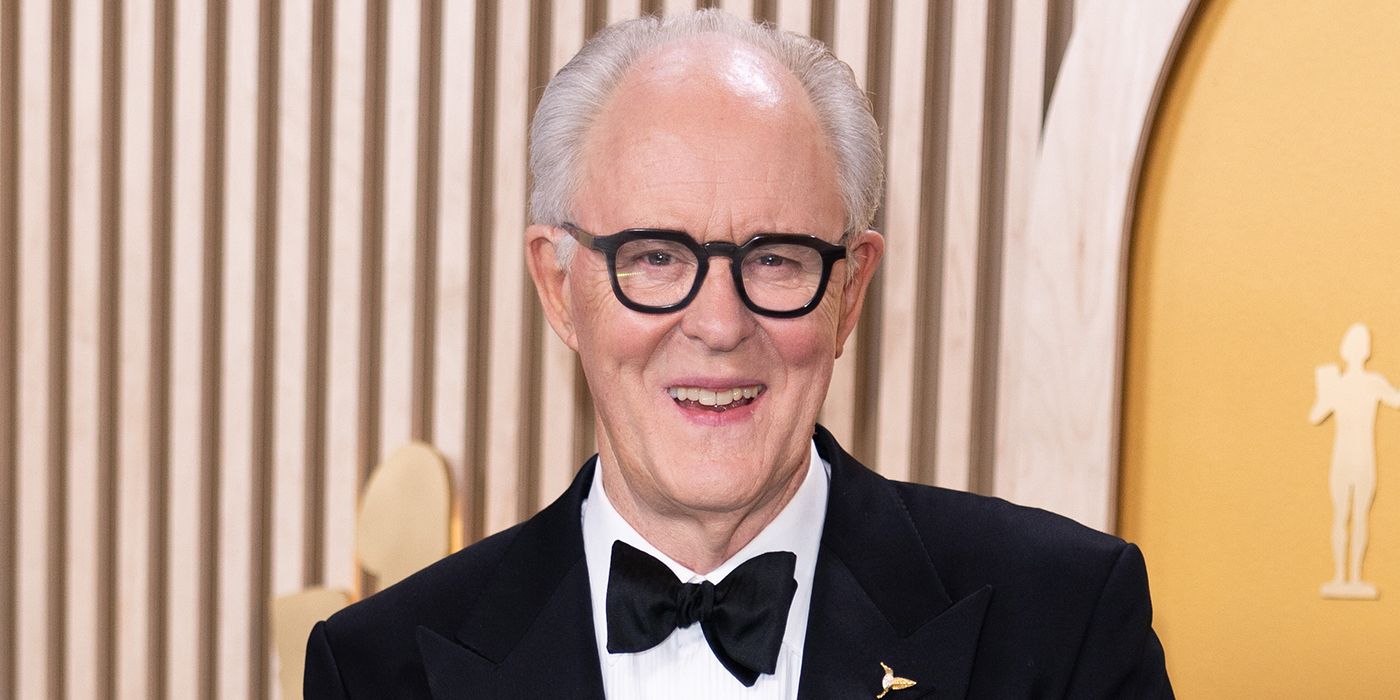 John Lithgow on a red carpet