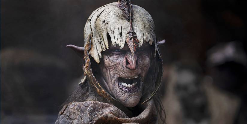 An orc turns to camera in Lord of the Rings Rings of Power