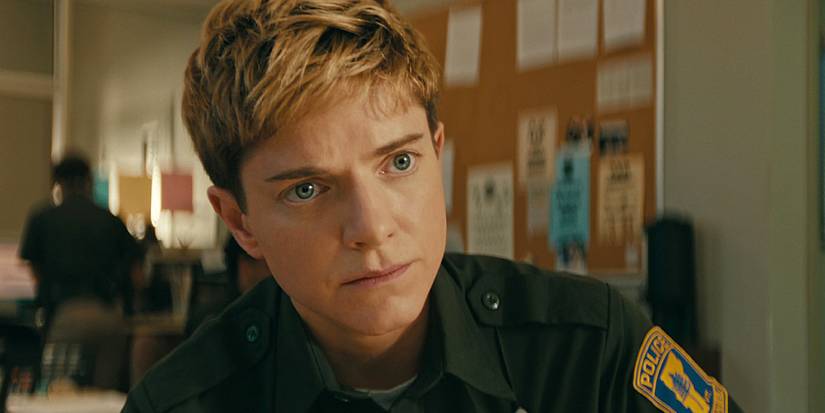 Mae Martin's Alex Dempsey looking stern in Wayward.