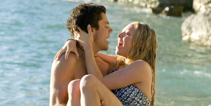 Dominic Cooper holds Amanda Seyfried in his arms and sings to her in Mamma Mia