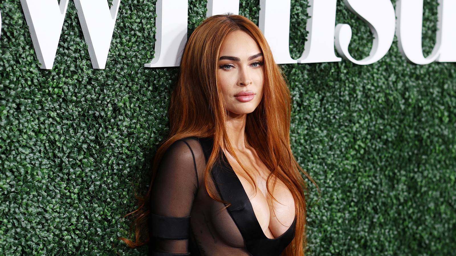 Megan Fox posing at a red carpet event