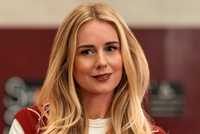 Justine Lupe as Morgan with a slight smirk in Nobody Wants This Season 2