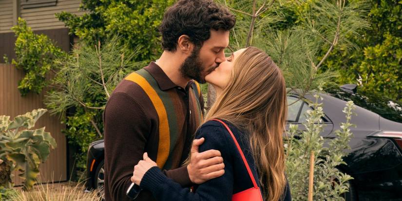Adam Brody as Noah and Kristen Bell as Joanne kissing while embracing in Nobody Wants This Season 2
