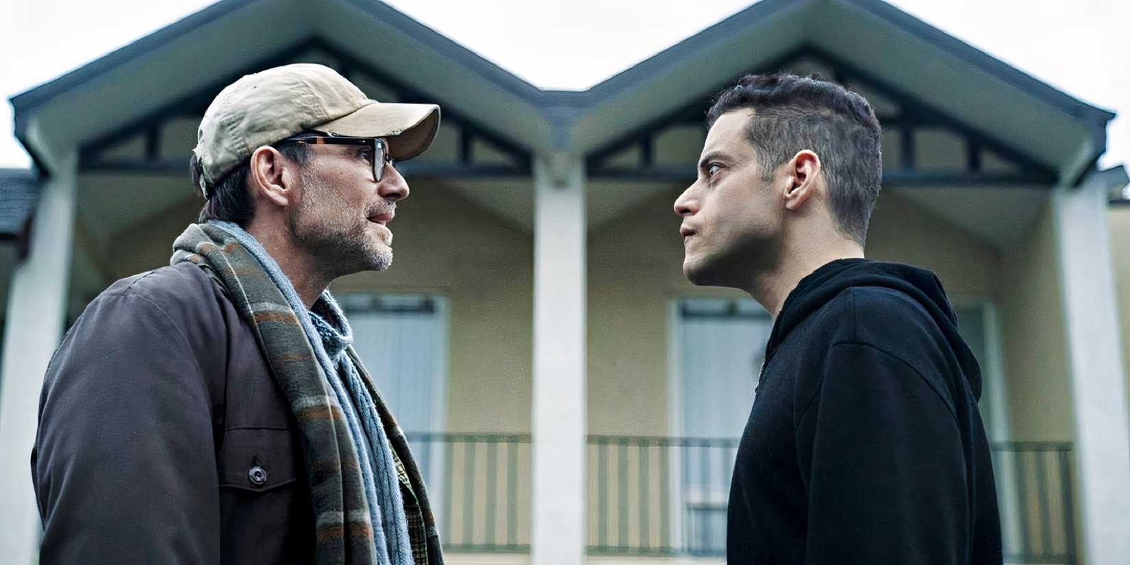 Rami Malek and Chirstian Slater look at each other in Mr Robot.