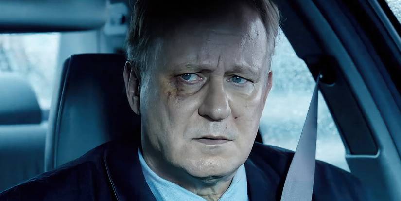 A bruised John River (Stellan Skarsgard) looks contemplative in 'River'
