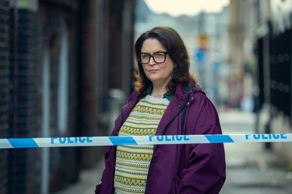 Ruth Jones stands next to a police cordon in Run Away