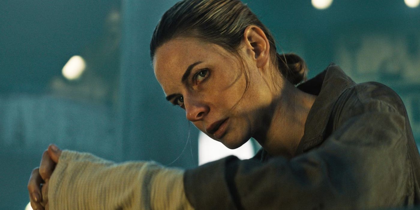 Rebecca Ferguson as Juliette Nichols looking cautiously at someone off camera in the pilot of 'Silo.'