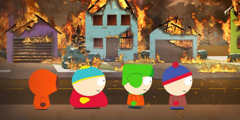 Kenny, Cartman, Kyle, and Stan walk past houses burning in South Park.