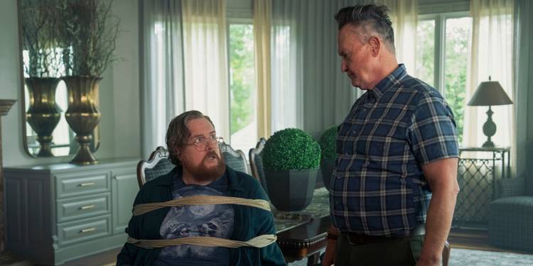 Peacemaker confronts his father Auggie