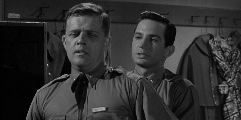 Ben Gazzara menaces a cadet in The Strange One (1957)