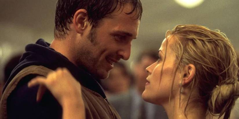 Jake and Melanie from Sweet Home Alabama dancing in the rain.