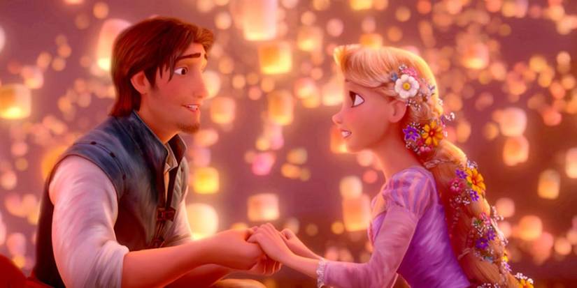 Flynn Rider and Rapunzel hold hands during a lantern festival in Tangled