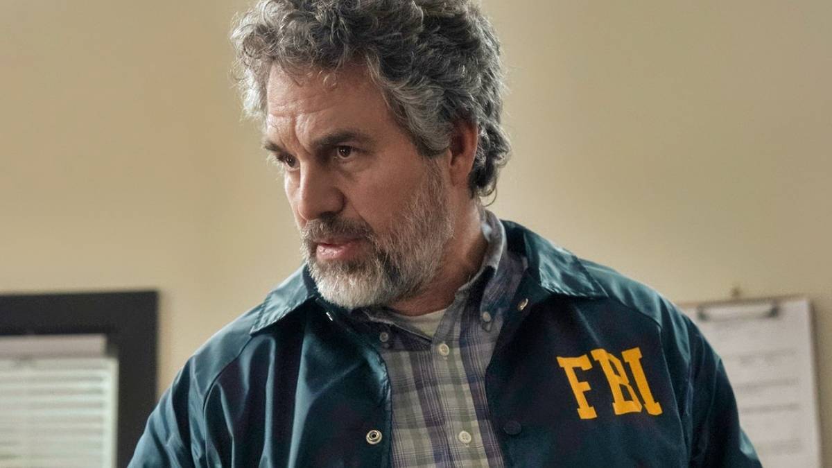 Mark Ruffalo wearing an FBI jacket and looking to his side in Task, Episode 5.