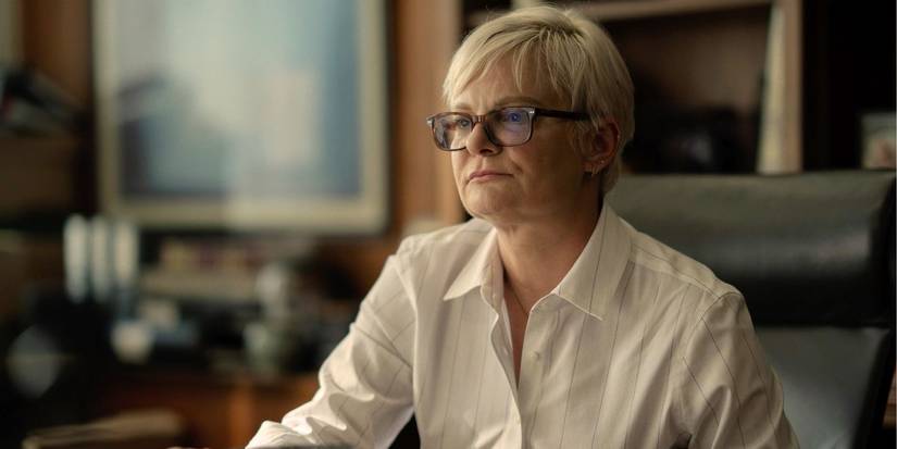 Kathy sitting her at her desk