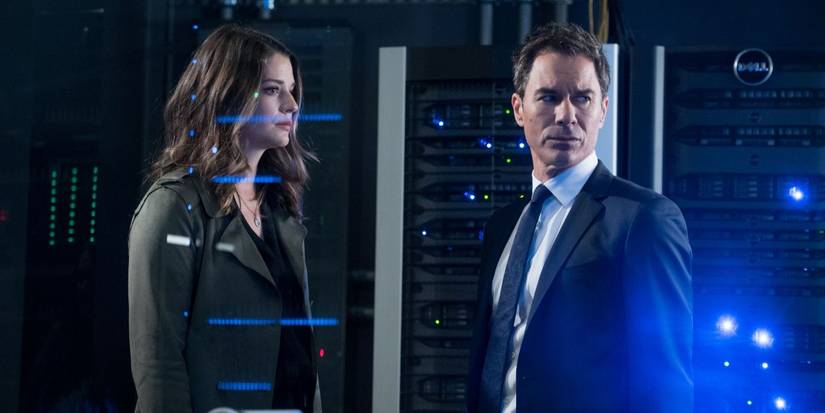 Kimberley Sustad and Eric McCormack in an episode of Travelers.