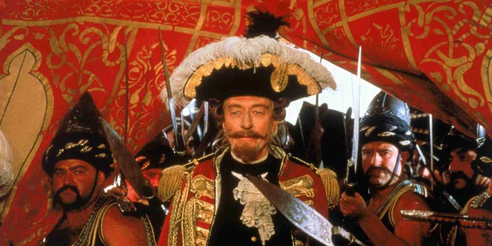 John Neville as Baron Munchausen in historic military uniform in The Adventures of Baron Munchausen.