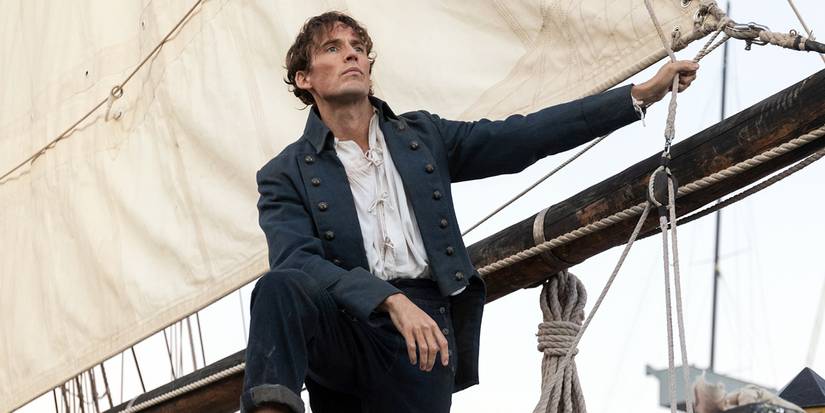Sam Claflin stands at the bow of a ship in 'The Count of Monte Cristo'