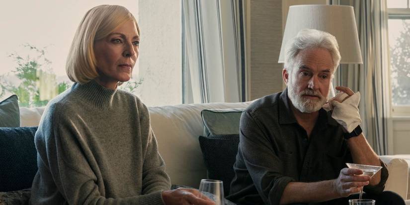 Allison Janney and Bradley Whitford sitting on a couch in 'The Diplomat' Season 3.