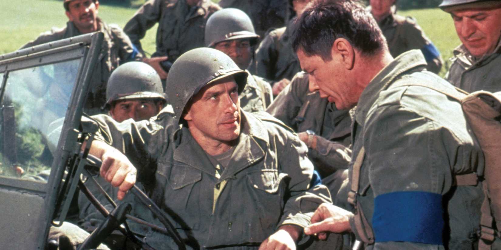 A group of soldiers talking in The-Dirty-Dozen