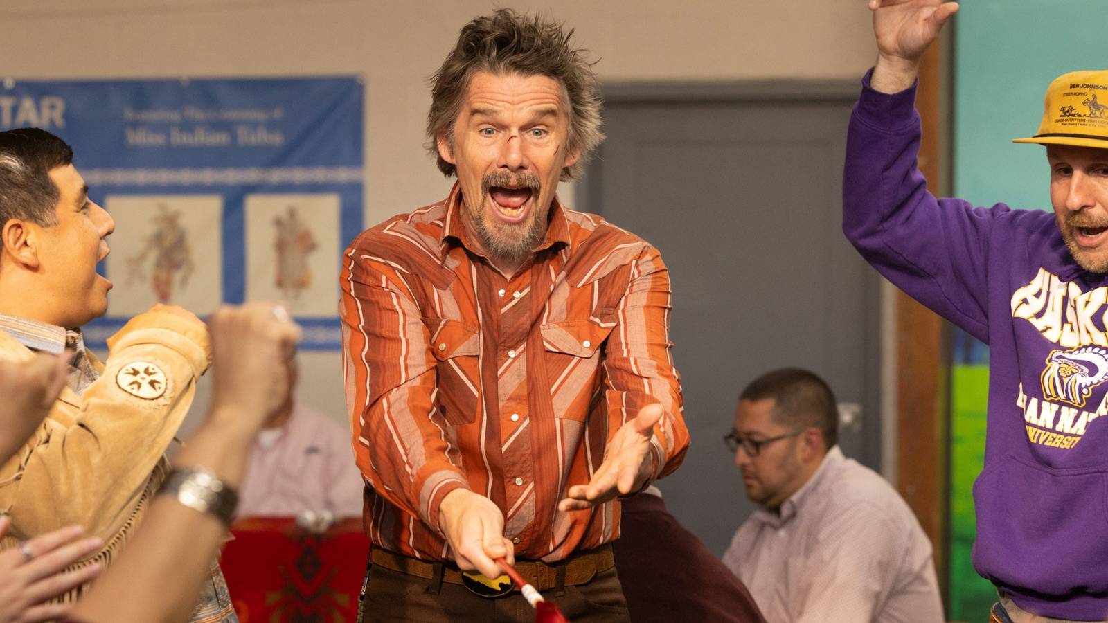 Ethan Hawke as Lee Raybon looking surprised while holding his arms out in front of him in The Lowdown