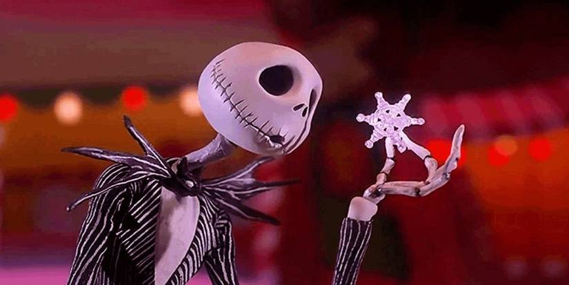 Jack Skellington holds a snowflake in The Nightmare Before Christmas.