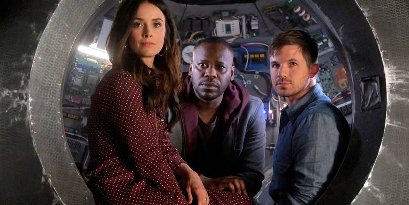 Abigail Spencer as Lucy, Malcolm Barrett as Rufus, and Matt Lanter as Wyatt looking out in Timeless.