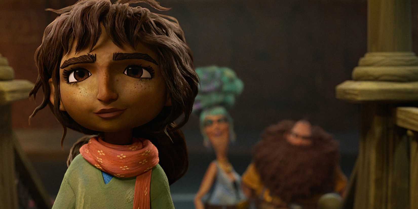 Beesha stands facing the camera, with Mr. and Mrs. Twit out of focus behind her in The Twits.