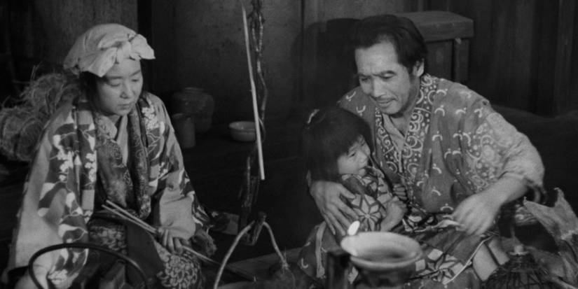 A couple with a small child in Ugetsu