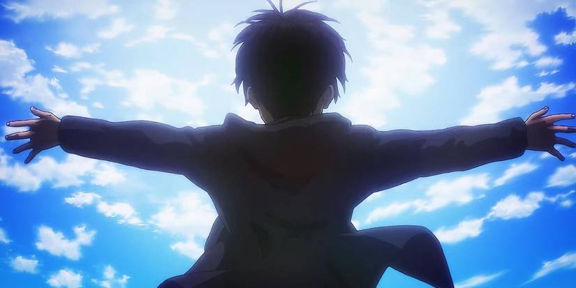 Young Eren with his arms wide open in front of a blue sky in Attack on Titan