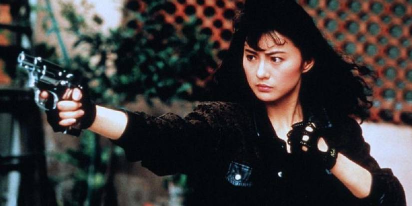 A woman points a gun in Angel 