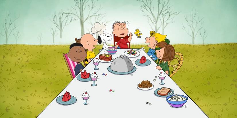 Linus, Snoopy, Charlie, Sally, Peppermint Patty, and Franklin gathered around a table in 'A Charlie Brown Thanksgiving'