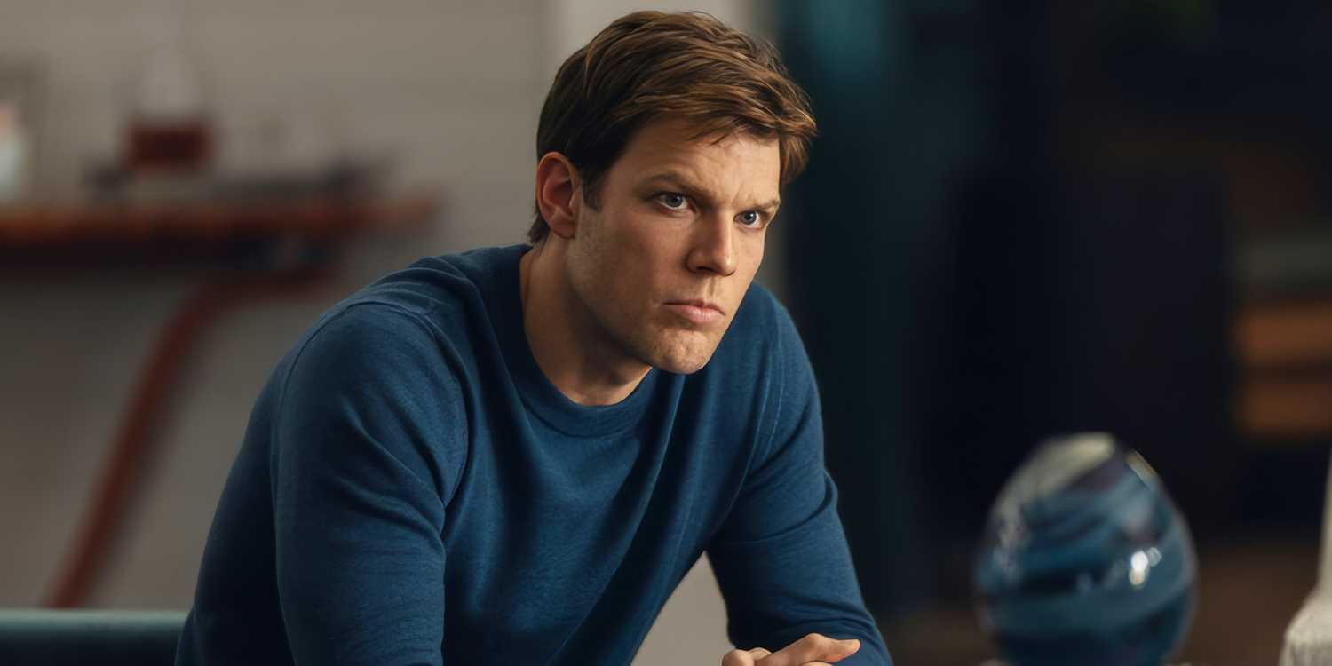 Jake Lacy sits looking concerned in All Her Fault