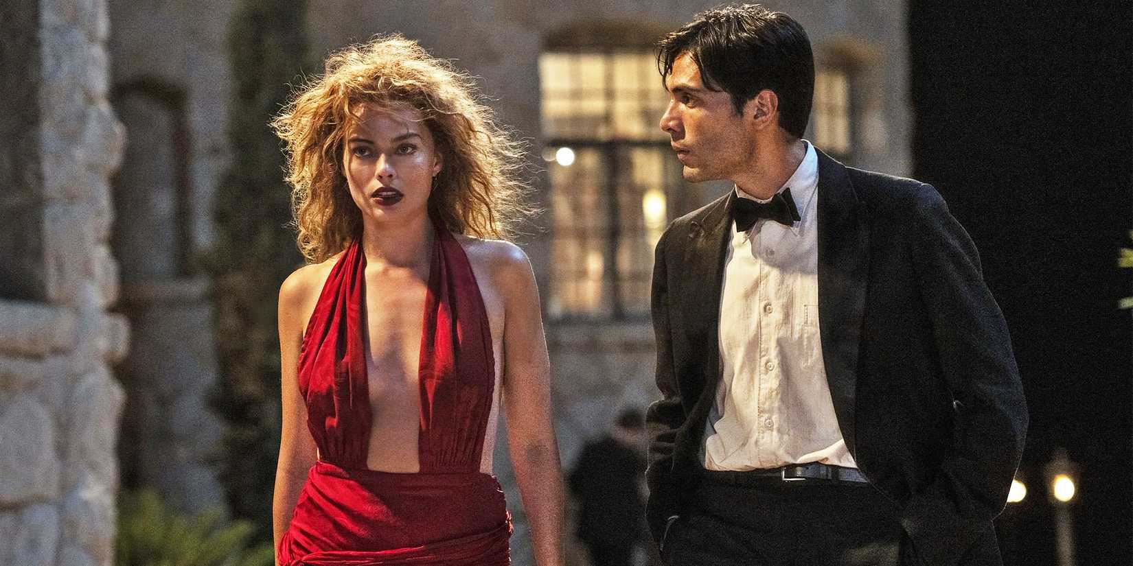 Margot Robbie and Diego Calva walking in Babylon