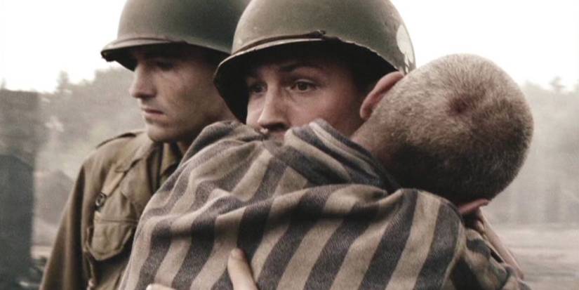 A soldier is hugged by a concentration camp survivor in the 'Band of Brothers' episode "Why We Fight"