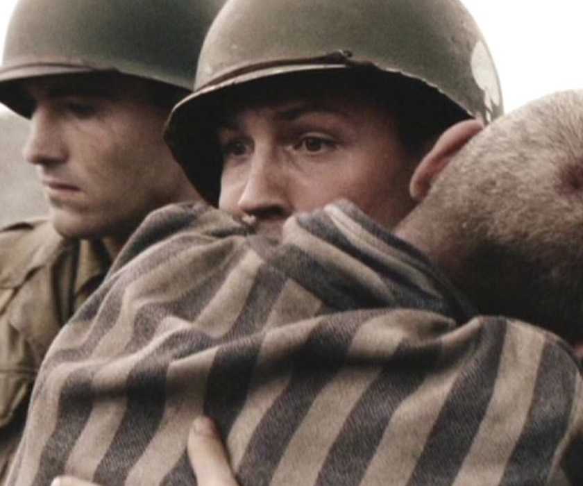 A soldier is hugged by a concentration camp survivor in the 'Band of Brothers' episode "Why We Fight"