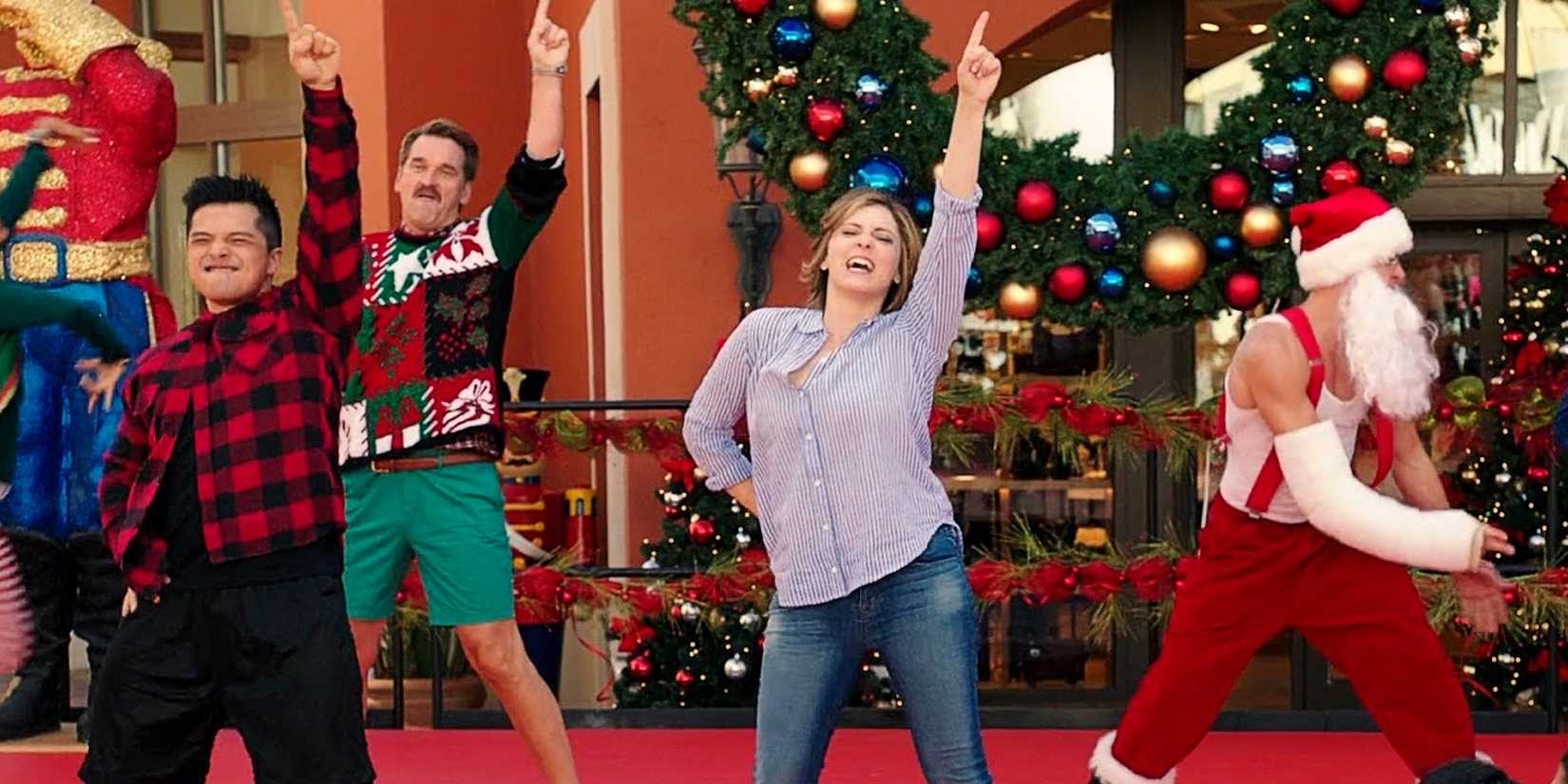 Rebecca, Josh, and Daryl dancing onstage at Christmastime in Crazy Ex-Girlfriend