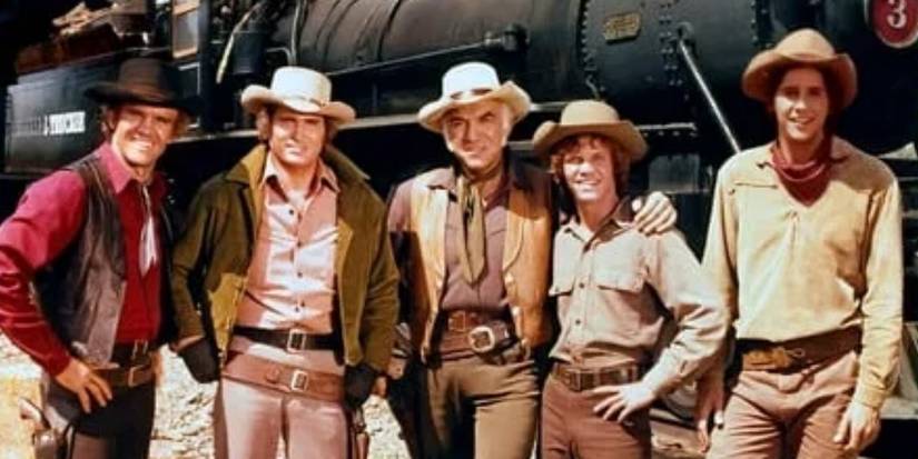 David Canary as "Candy" Canaday, Michael Landon as "Little" Joe Cartwright, Lorne Greene as Ben Cartwright, Mitch Vogel as Jamie Hunter Cartwright, and Tim Matheson	 as Griff King in 'Bonanza' Season 14