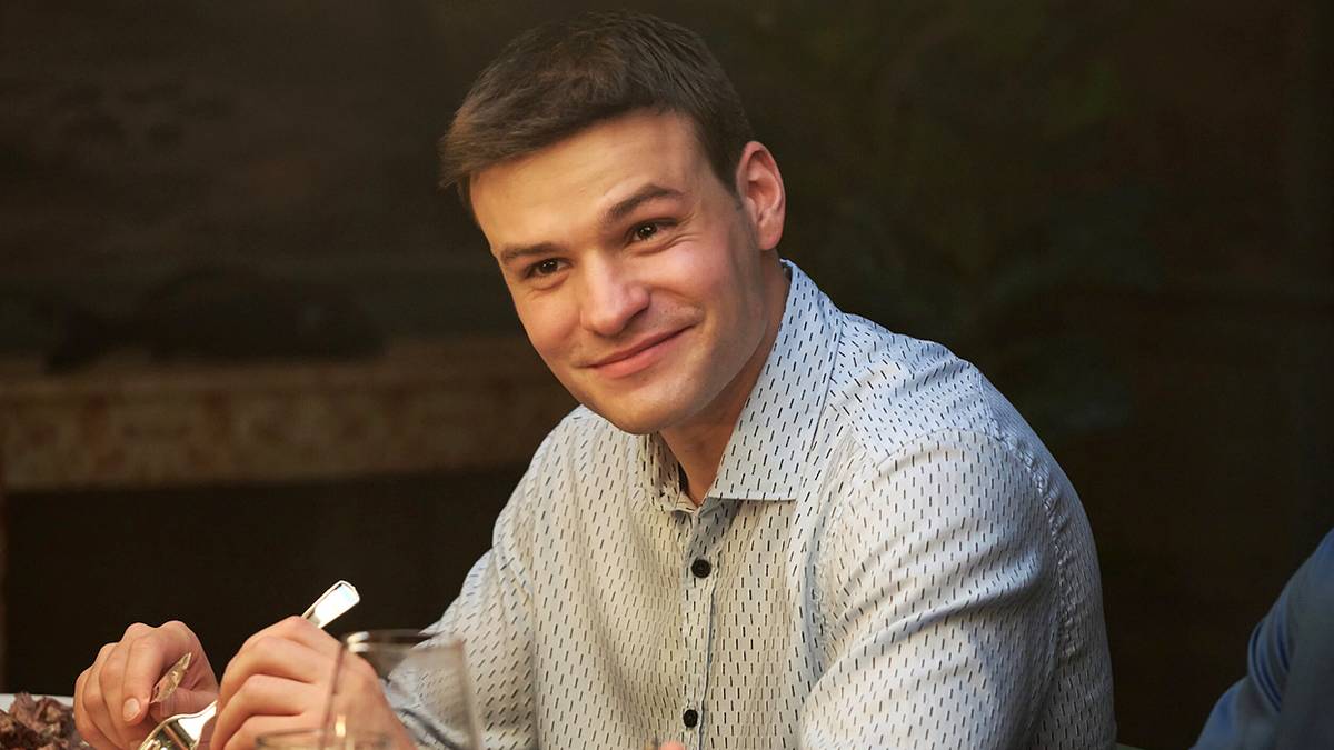 Mika Amonsen as Sean Reagen sits at a family dinner in Boston Blue