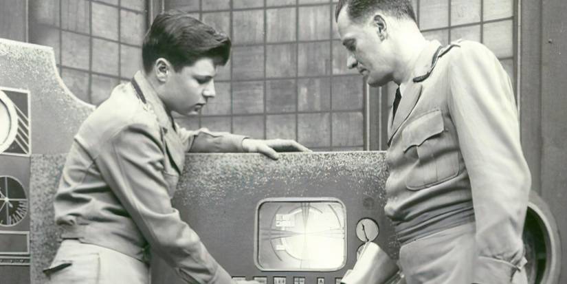 Captain Video (Richard Coogan) beside his sidekick on 'Captain Video and His Video Rangers'