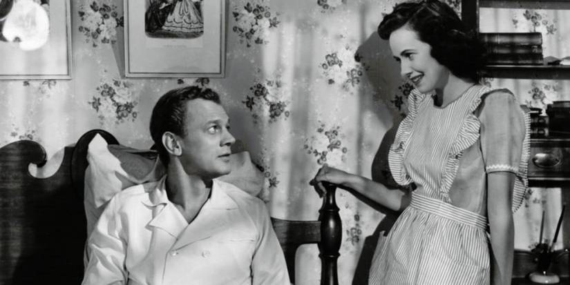 Charlie (Teresa Wright) stands by Uncle Charlie's (Joseph Cotten) bedside in Shadow of a Doubt.