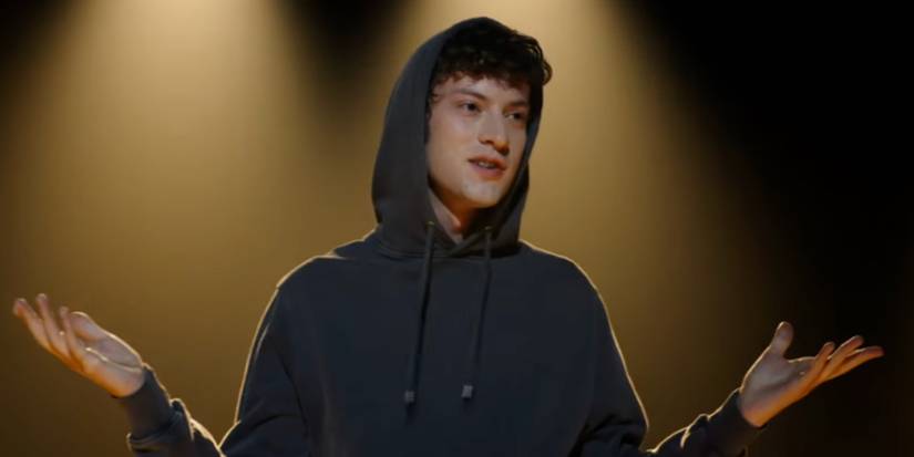 Bosco LaRoy (Dominic Sessa) standing on stage in Now You See Me: Now You Don't.