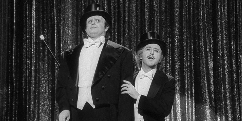 Dr. Frederick Frankenstein (Gene Wilder) and his monster (Peter Boyle) prepare to perform "Puttin' on the Ritz" in Young Frankenstein