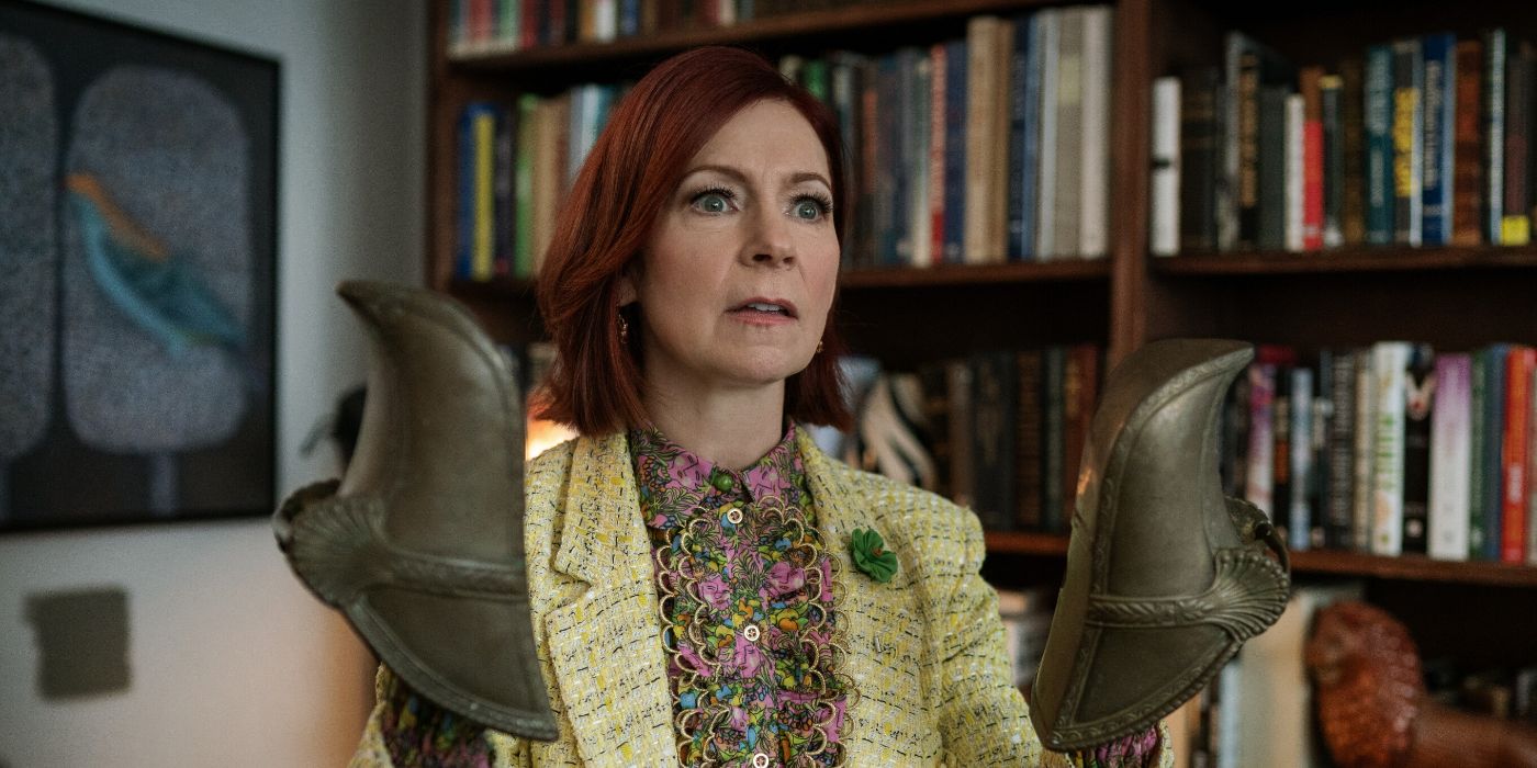 Carrie Preston wearing armor pieces on her hands in Elsbeth Season 3