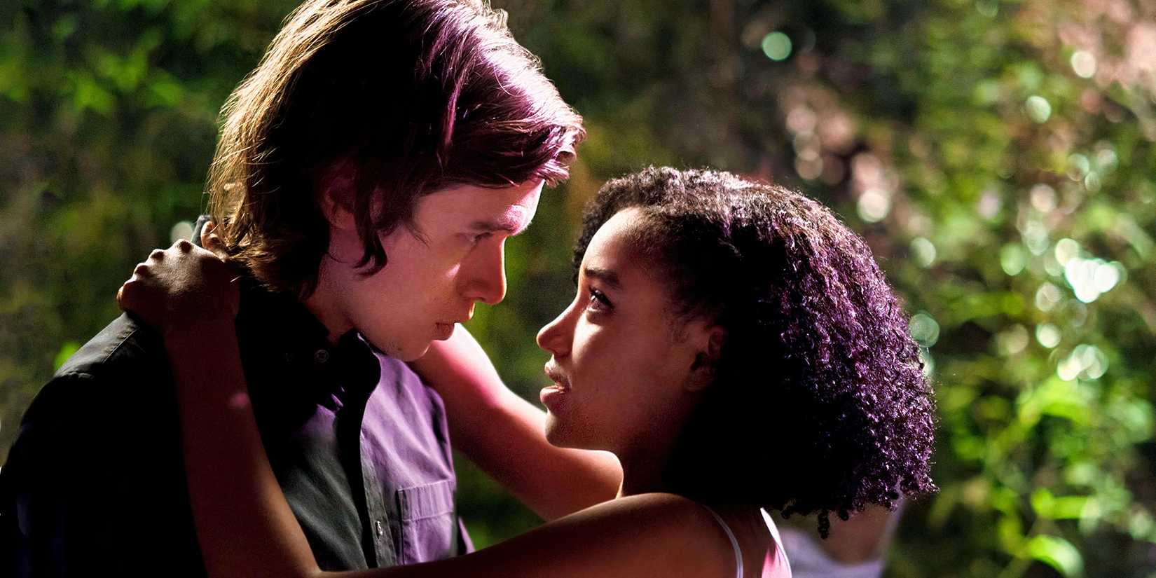 Everything, Everything's protagonists holding one another and staring lovingly.