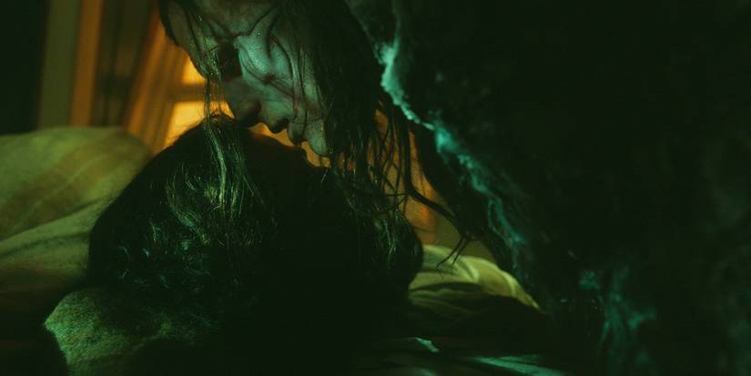 The Creature (Jacob Elordi) forgives Victor (Oscar Isaac) and kisses him as he dies in 'Frankenstein' (2025)