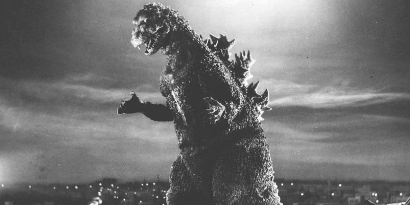 Godzilla in the original 1954 movie staring down the Japanese army and reading for combat