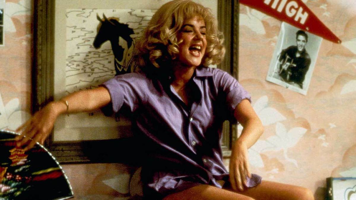 Rizzo singing, dressed as Sandy in 'Grease'