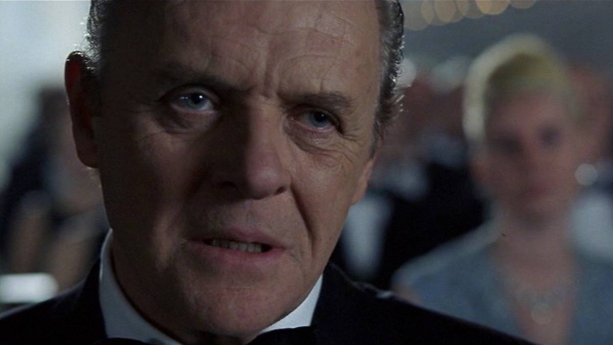 Anthony Hopkins standing in front of a crowd in Hannibal